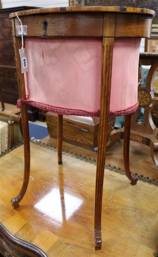 A George III satinwood oval work table, H 73cm